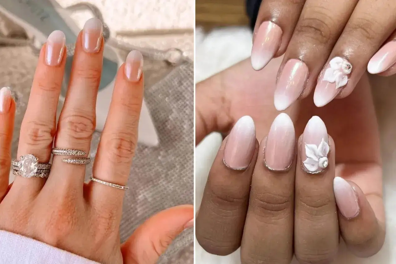 Eleganckie ombre nails w odcieniach różu i bieli, z subtelnymi zdobieniami kwiatowymi i błyszczącymi pierścionkami.